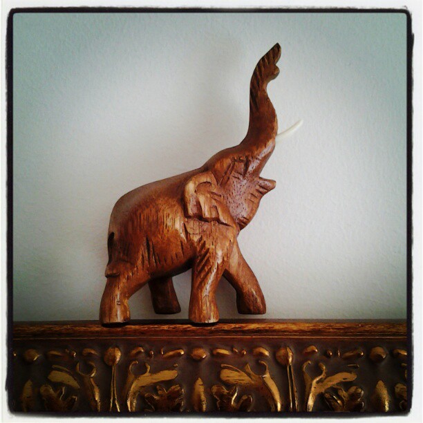 On My Shelves. A Bring-back from Thailand. A Wooden Elephant