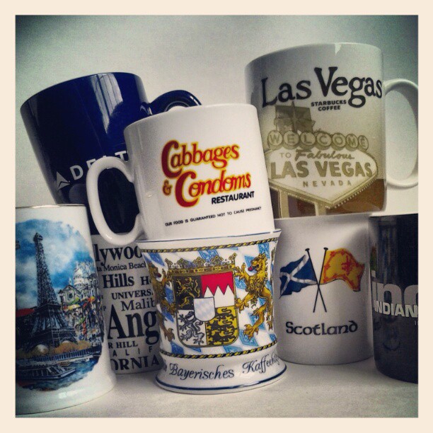 On My Shelves. My Collection of bringback mugs from Scotland, France, Germany, and other countries